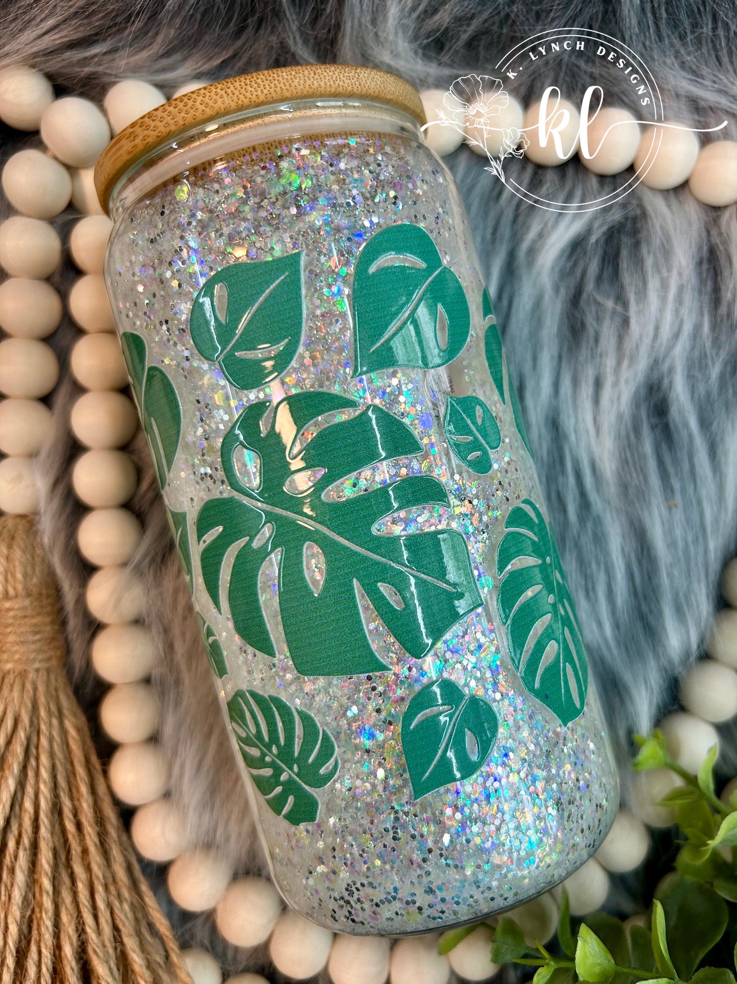 16 oz. Glitter Globe Glass Can - Green Monstera Leaves with Opal Glitter