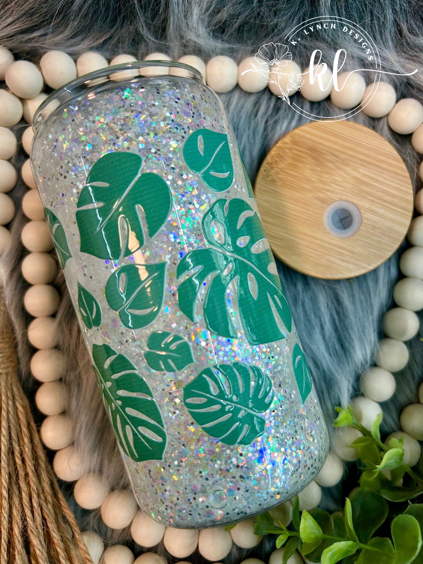 16 oz. Glitter Globe Glass Can - Green Monstera Leaves with Opal Glitter