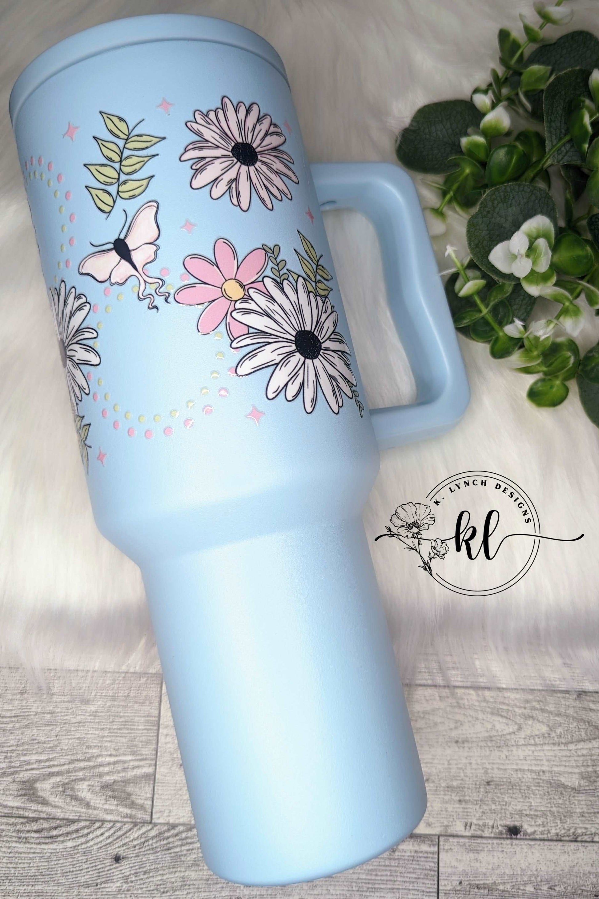 40 oz. Light Blue Handle Tumbler w/Pink Moths and Floral Daisy Design