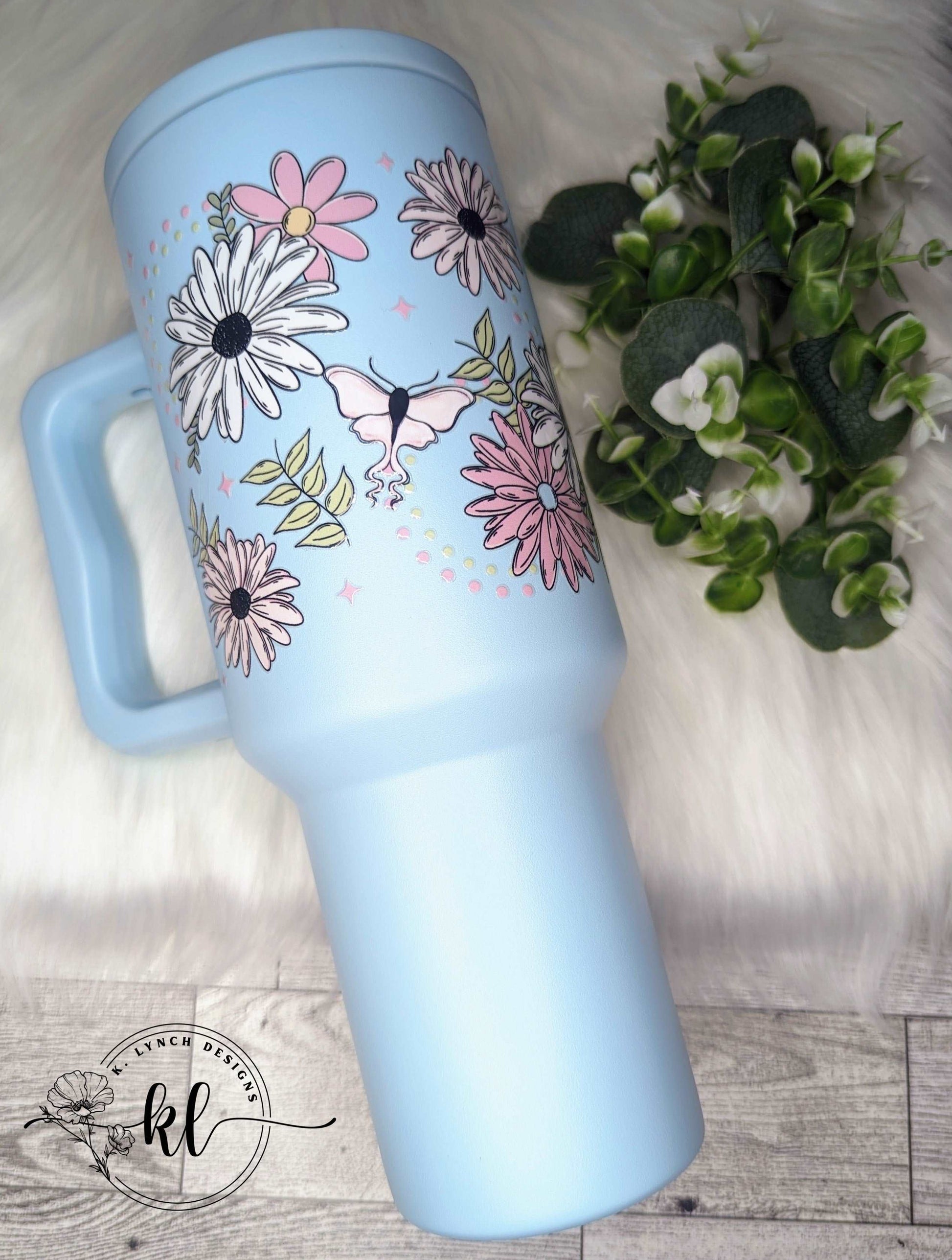 40 oz. Light Blue Handle Tumbler w/Pink Moths and Floral Daisy Design